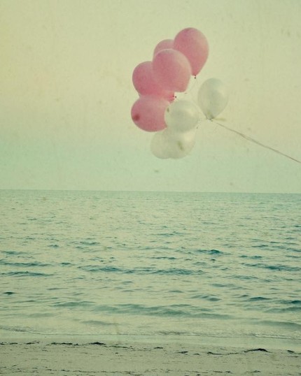 Balloons by the Ocean photo